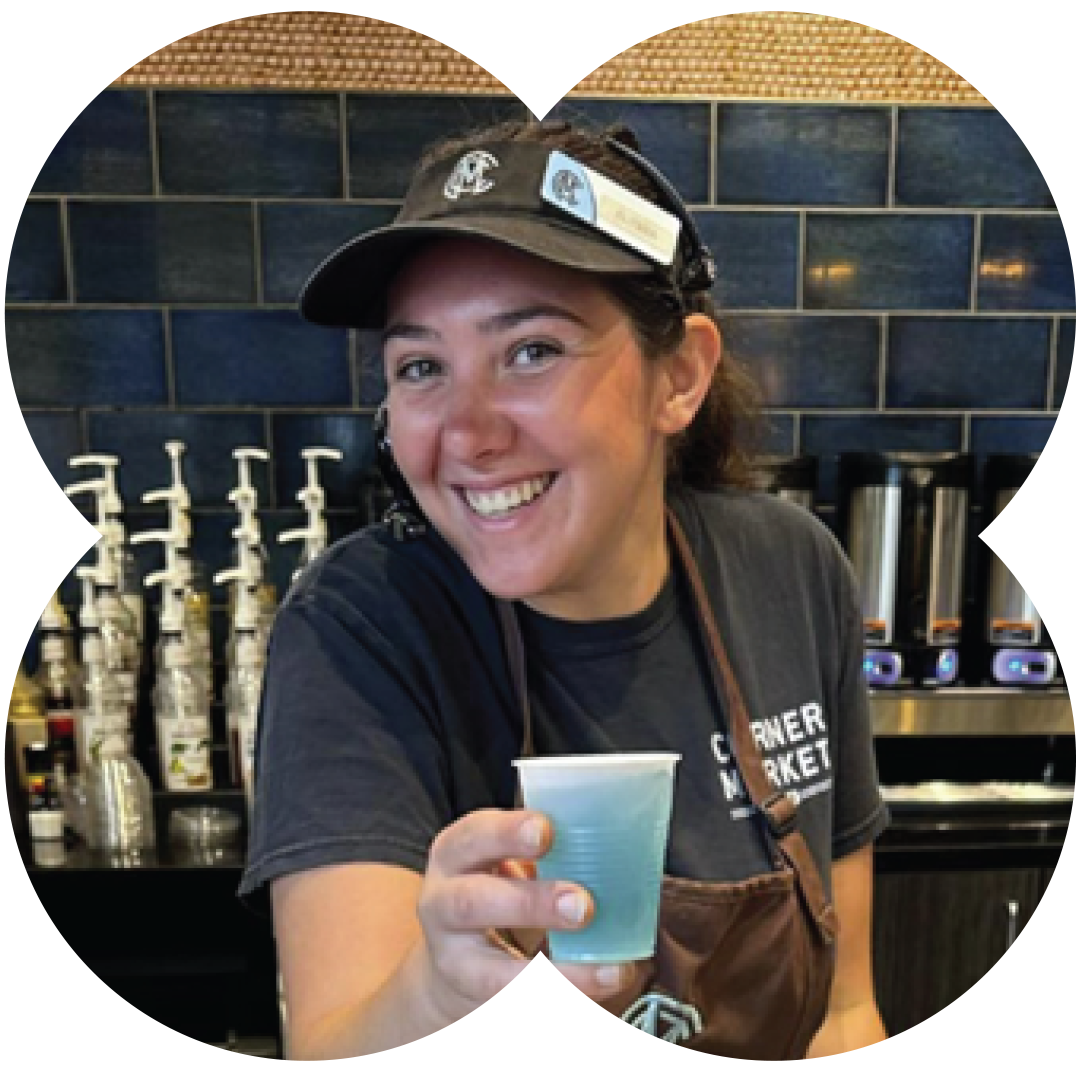 Employee holding a cup